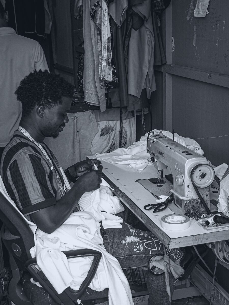 A tailor at his machine in his Accra workshop. Photo by David Geneugelijk.